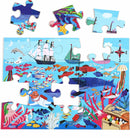 A colorful jigsaw puzzle featuring a vibrant underwater scene with various fish, jellyfish, and sea creatures. There is a depiction of a ship sailing on the waves, surrounded by coral reefs and treasure chests. Several jigsaw pieces are shown, with some already placed in the puzzle, displaying intricate illustrations of marine life.