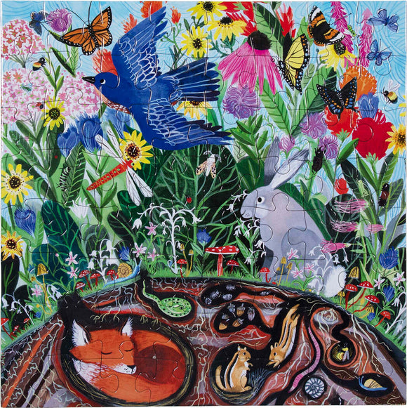 A colorful jigsaw puzzle titled 'Wild Things' by Eeboo, depicting a vibrant scene of nature with animals like a rabbit and a fox, set against a backdrop of various flowers, butterflies, and insects, encouraging exploration and creativity.