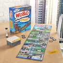 A colorful board game titled 'Word On The Street' by Educational Insights is displayed on a wooden table. The game box features vibrant artwork with cars and text promoting it as a family/party game. The game board is spread out beside the box, showcasing a layout with various letters, words, and graphics of city scenes. An hourglass timer and a stack of game cards are also present, indicating gameplay elements and a fun interactive experience.