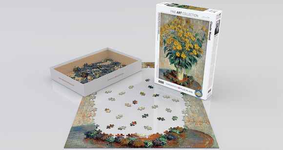 Eurographics 1000-piece jigsaw puzzle featuring a beautiful painting of Jerusalem Artichoke Flowers by Claude Monet. The box shows the completed artwork, while the puzzle pieces are partially assembled on a flat surface, showcasing vibrant colors and intricate details.