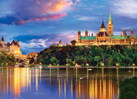 Ottawa Parliament Hill jigsaw puzzle by Eurographics showcasing a vibrant sunset over the historic Parliament buildings, reflecting on the river, surrounded by lush greenery.