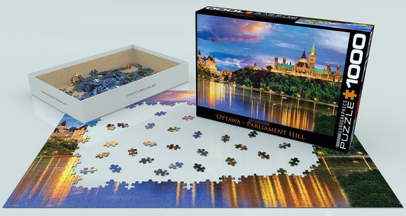 Eurographics jigsaw puzzle of Ottawa's Parliament Hill featuring 1000 pieces. The puzzle showcases a beautiful evening view of the Parliament buildings with reflections on the water.