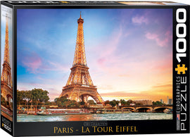 Eurographics jigsaw puzzle featuring a stunning depiction of the Eiffel Tower at sunset. The puzzle contains 1000 pieces and is part of the City Collection, showcasing the iconic Parisian landmark against a beautiful sky.