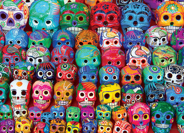 A colorful display of traditional Mexican skulls, showcasing intricate designs and vibrant colors, ideal for a jigsaw puzzle. The skulls feature various artistic patterns including floral and animal motifs, representing the rich cultural heritage of Mexico. Perfect for puzzle enthusiasts and lovers of traditional art.
