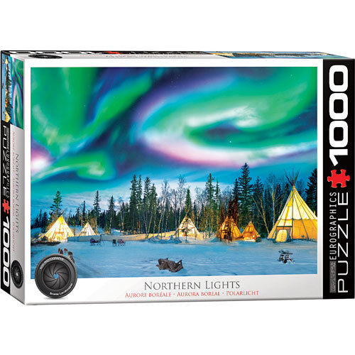 Eurographics 1000-piece jigsaw puzzle titled 'Northern Lights, Yellowknife.' Features a stunning image depicting the vibrant auroras illuminating a snowy landscape with teepees in the foreground, surrounded by pine trees under a night sky.