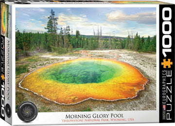 The Morning Glory Pool jigsaw puzzle by Eurographics showcases a stunning image of Yellowstone National Park's iconic geothermal feature. The puzzle features vibrant colors of the pool, surrounded by lush greenery and a captivating landscape, providing a challenging and enjoyable puzzle experience.