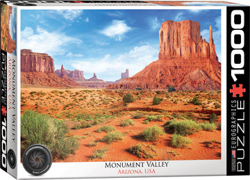 Eurographics 1000-piece jigsaw puzzle of Monument Valley, Arizona, featuring stunning red rock formations against a blue sky. Perfect for puzzle enthusiasts and landscape lovers.