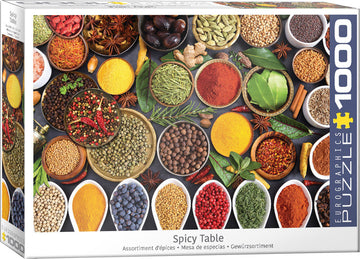 Eurographics Spicy Table jigsaw puzzle featuring an array of colorful spices and herbs displayed in bowls and plates. The image showcases vibrant hues of red, yellow, green, and pink, illustrating a rich assortment of ingredients, perfect for puzzle enthusiasts who enjoy culinary themes.