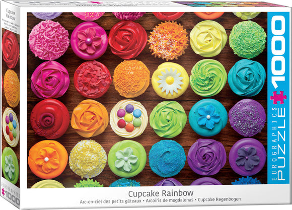 Eurographics Cupcake Rainbow jigsaw puzzle featuring a vibrant assortment of colorful cupcakes with various decorative frosting styles. The puzzle contains 1000 pieces, ideal for puzzle enthusiasts who enjoy vivid and whimsical designs.