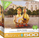 A colorful jigsaw puzzle box titled 'Duck Tours' by Eurographics featuring two cartoon ducks wearing hats and holding a map. The background shows a cityscape, ideal for family fun with large pieces for easy handling.