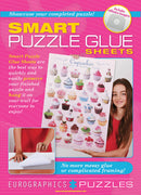 Individual Smart Puzzle Glue S by Eurographics. This product features Smart Puzzle Glue Sheets designed for preserving and displaying completed jigsaw puzzles. The vibrant packaging highlights the cupcakes design and showcases a child showcasing a finished puzzle. Includes adhesive hangers for mess-free wall mounting.