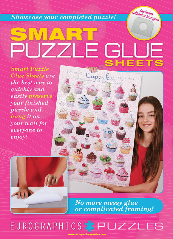 Individual Smart Puzzle Glue S by Eurographics. This product features Smart Puzzle Glue Sheets designed for preserving and displaying completed jigsaw puzzles. The vibrant packaging highlights the cupcakes design and showcases a child showcasing a finished puzzle. Includes adhesive hangers for mess-free wall mounting.