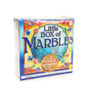 A colorful box titled 'Little Box of Marbles' by House of Marbles, featuring a vibrant design with various marbles in different colors and patterns. The box is playful and eye-catching, making it a delightful addition to games for all ages. A warning label about choking hazards is visible, indicating that the product is not suitable for children under 3 years old.