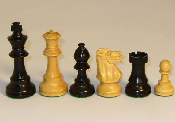 A collection of 3.75 inch black and natural boxwood chessmen arranged in a row. The set includes various chess pieces like a king, queen, rook, knight, and pawn, showcasing the elegant design and smooth finish typical of high-quality chess pieces. The contrasting black and natural wood colors enhance the visual appeal, making this chess set suitable for both play and display.