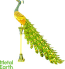 A beautifully crafted DIY model of a peacock by Fascinations. The peacock features intricate details with vibrant colors, showcasing a majestic tail adorned with eye-catching patterns. The model is mounted on a decorative base, enhancing its elegance and artistry.