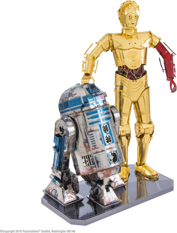 Metal Earth DIY kit featuring intricately designed metallic figures of R2-D2 and C-3PO from Star Wars. Both robots are displayed on a reflective base, showcasing their detailed craftsmanship and vibrant colors, perfect for collectors and fans.