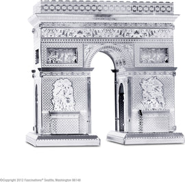 A detailed metal model of the Arc de Triomphe, showcasing intricate engravings and a shiny silver finish. The model features two tall pillars with ornate designs and a central archway, emphasizing architectural elegance. Perfect for DIY enthusiasts and model collectors.