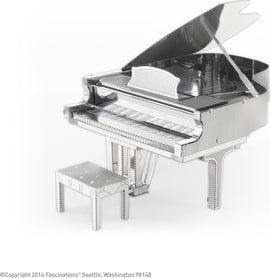 A detailed Metal Earth DIY kit of a Grand Piano and its matching bench, made by Fascinations. The intricately designed model features a shiny metallic finish, complete with realistic piano keys and opened lid, perfect for music enthusiasts and hobbyists alike.