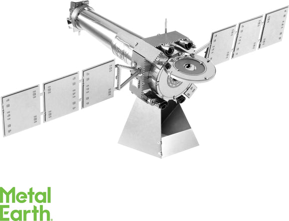 A detailed metal model of the Chandra X-Ray Observatory by Fascinations, showcasing its intricate features including the telescope and solar panels. The model is constructed from metal sheets and is perfect for DIY enthusiasts and space exploration fans.