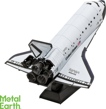 A detailed metal model of the NASA Space Shuttle Atlantis, showcasing its sleek design and intricate features, including the engines and wings. The model is mounted on a black base and features the iconic NASA logo and 'United States' inscription.
