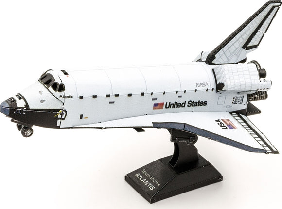 A detailed metal model kit of the Space Shuttle Atlantis, designed by Fascinations. The model features intricate components including the shuttle's nose, wings, and landing gear, showcasing its signature white and black color scheme with NASA logos and the name 'Atlantis' visible on the side. Perfect for enthusiasts and collectors, this DIY kit captures the essence of this iconic spacecraft.