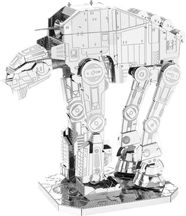 A detailed metal model of the AT-M6 Heavy Assault Walker, showcased in a standing position. The intricate design features articulated limbs and a realistic exterior, highlighting the craftsmanship of the DIY kit by Fascinations.
