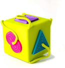 The OombeeCube is a vibrant and engaging toy designed for toddlers, featuring a colorful yellow cube with easy-to-grasp shapes: a pink circle, a purple square, and a blue triangle. Each shape is designed for young children to fit into corresponding cut-out spaces on the cube, promoting fine motor skills and shape recognition. The toy is equipped with soft, safe materials and bright colors, making it visually appealing and safe for little hands.