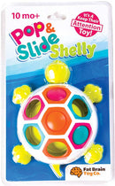 Pop N Slide Shelly is a colorful turtle toy designed for children aged 10 months and older. The toy features multiple hexagonal holes with brightly colored pushable buttons in orange, blue, pink, and green. It is ideal for keeping babies engaged and developing their motor skills. The turtle shape and vibrant colors add visual appeal, making it a fun attention-catching toy.