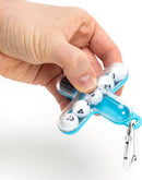 A hand holding a Tiltago Keychain Asst from Fat Brain. The keychain features a colorful mechanical puzzle design with numbered balls inside a transparent casing, providing a tactile and engaging experience for users.