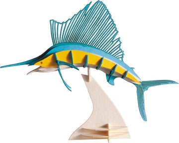 A colorful 3D paper model of a sailfish, designed by Fridolin. The model features vibrant blue and yellow colors, and is intricately detailed, showcasing the sailfish's fins and body structure. This DIY kit is perfect for hobbyists and craft enthusiasts looking to create a striking display piece.