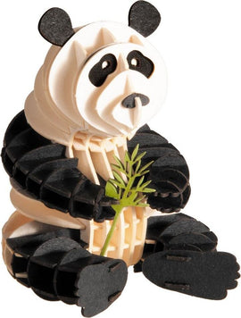 A detailed 3D paper model of a panda holding a piece of bamboo. The panda is crafted from layered paper, showcasing black and white colors and lifelike features. It is positioned sitting down, with a playful expression, making it an ideal decoration or DIY craft project for animal lovers.