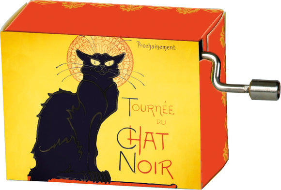 A yellow and orange music box featuring a black cat design, labeled 'Tournée du Chat Noir', with a winding mechanism on the side for playing music.