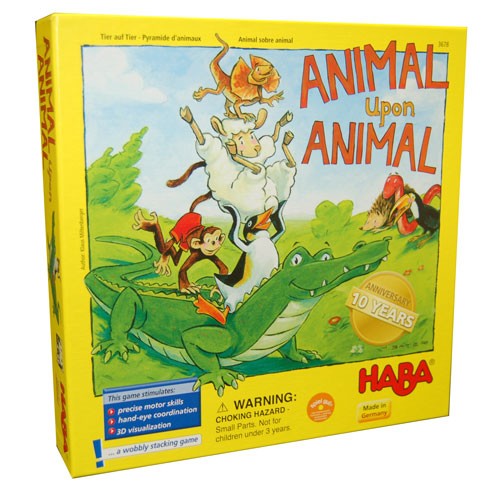 Animal Upon Animal game box by HABA featuring colorful cartoon animals stacked on top of each other. The illustration includes a crocodile, various farm animals, and children, promoting motor skills and hand-eye coordination. The box highlights the game's 10th anniversary.