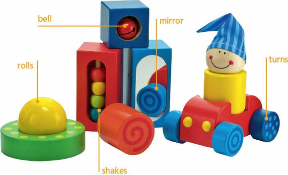 HABA First Blocks game featuring colorful wooden blocks in various shapes. Includes a smiling character with a striped hat, a mirror block, and a rolling bell. Each block has interactive elements like a bell, a mirror, vibrant colors, and shapes, designed to stimulate sensory exploration and encourage fine motor skills in children.