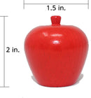 A bright red apple-shaped wooden game piece measuring 2 inches tall and 1.5 inches wide. It is smooth and rounded, perfect for children’s games.