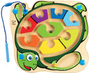 A colorful, wooden sea turtle puzzle by HaPe International featuring various shapes in vibrant colors. The turtle's design includes a friendly cartoon face, and the pieces are arranged in a playful manner, enhancing fine motor skills as children maneuver each piece into place.