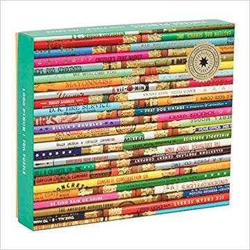 Phat Dog Vintage Pencils Foil jigsaw puzzle by Galison featuring an artistic design of colorful pencil-like illustrations stacked on a vibrant background. The puzzle includes 1000 pieces, making it a fun and challenging activity for all ages.