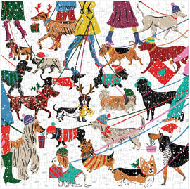 A colorful jigsaw puzzle featuring various breeds of dogs in winter attire. Dogs are depicted on leashes, wearing festive hats and outfits, with a cheerful winter scene background. The illustration captures a vibrant community walk with playful detailing, perfect for dog lovers and puzzle enthusiasts alike.