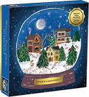 A beautifully illustrated puzzle box featuring a winter-themed snow globe scene. Inside, it contains 500 pieces depicting charming houses surrounded by snow and trees, complete with a crescent moon in the starry sky. The box is adorned with the text 'Season's Greetings!' and a gold seal indicating it's a foil puzzle made by Galison.