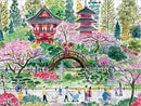 A picturesque jigsaw puzzle featuring a Japanese tea garden. The scene depicts traditional pagodas surrounded by cherry blossoms and lush greenery. People stroll across a charming bridge, enjoying the serene atmosphere. The vibrant colors and intricate details suggest a peaceful day in this beautiful garden.