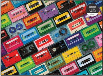 Colorful assortment of vintage cassette tapes on a jigsaw puzzle, featuring various designs and colors. Ideal for music lovers and puzzle enthusiasts, the puzzle consists of 1000 interlocking pieces, providing a challenging and engaging activity.