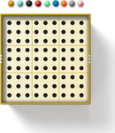 A top view of the Sudoku With Some Balls Game by Chronicle Books. The game features a grid with nine squares, each containing black dots on a cream background. Above the grid, there are six colorful balls in varying shades, including red, blue, green, and more, adding a playful touch to the game design.