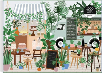 A colorful and intricately illustrated jigsaw puzzle titled 'Plant Cafe' by Galison. The scene depicts a vibrant outdoor cafe filled with various plants, including succulents, palms, and ferns. Beautiful desserts are displayed on wooden tables, enhancing the inviting atmosphere. A charming food truck is visible in the background, adorned with signage detailing plants and cafe offerings. The puzzle consists of 1000 pieces, perfect for plant lovers and puzzle enthusiasts alike.