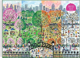 A colorful jigsaw puzzle titled 'Dog Park in Four Seasons' by Galison. The scene is divided into four sections, each representing a different season. The vibrant artwork showcases dogs and people enjoying the park during spring, summer, fall, and winter, with detailed trees and city skyline in the background.
