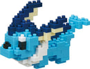 A colorful Nanoblock Vaporeon DIY kit, featuring a small, detailed model of the water-type Pokémon. The model is made of various light blue, dark blue, and white blocks, showcasing Vaporeon's signature fin, eyes, and tail, all in a compact and playful design, perfect for building enthusiasts and fans.