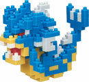 A colorful Nanoblock Gyarados DIY kit showcasing a detailed blue and yellow dragon-like creature, featuring intricate block designs and a recognizable facial expression, perfect for building enthusiasts.