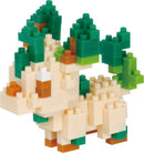 A colorful Nanoblock model of Leafeon, featuring intricate details like green leaf-like structures on its head and a cream-colored body. The assembly showcases a fun DIY experience perfect for fans of building toys.