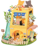 Colorful DIY miniature cat house kit by Robotime, featuring a multi-level design with playful cat figures, a slide, scratching post, and vibrant decorations. Ideal for creative adults or kids looking to assemble their own cat-themed playhouse.