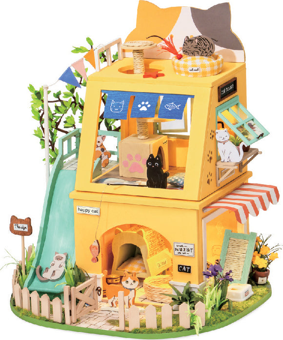 Colorful DIY miniature cat house kit by Robotime, featuring a multi-level design with playful cat figures, a slide, scratching post, and vibrant decorations. Ideal for creative adults or kids looking to assemble their own cat-themed playhouse.