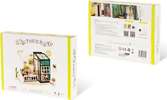 The Fancy Balcony Daydreaming Model Kit by Robotime is a detailed DIY miniature house kit featuring a charming balcony, greenery, and interior furnishings. The box showcases both the front and back views of the kit, highlighting its intricate design and the crafting possibilities it offers.